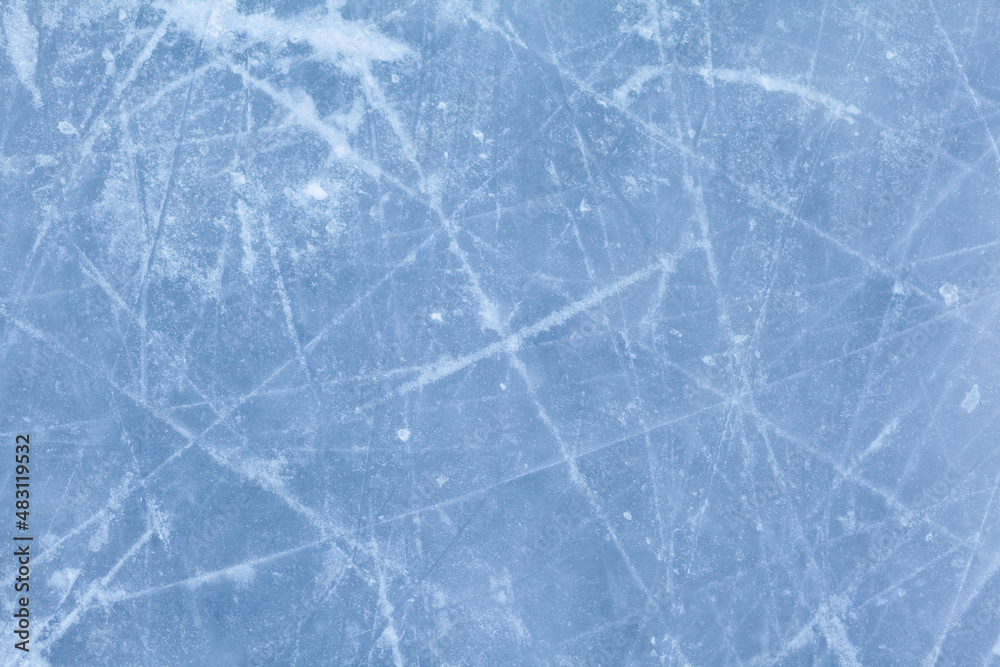 Aufkleber empty ice rink with skate marks after the session outdoor. skating ice rink texture covered with sno