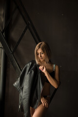 blonde girl in a leather jacket 
