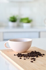 Black coffee in a white mug, Coffee beans