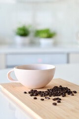 Obraz na płótnie Canvas Black coffee in a white mug, Coffee beans