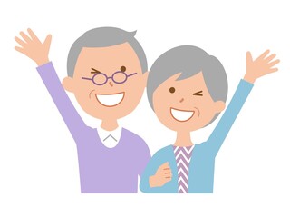 バンザイをするシニア夫婦