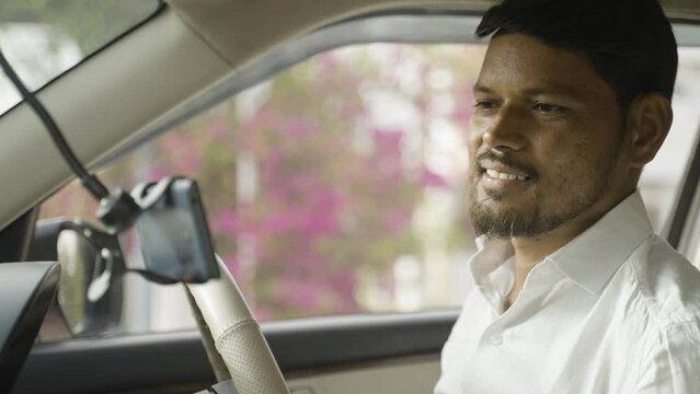 Cab driver using map navigation or gprs on mobile phone for travelling - cocnept of technology, smartphone and internet
