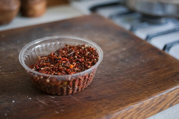 Hot pepper spice stands in the kitchen