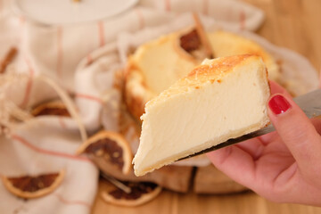 juicy cheesecake baked by hand by professional pastry woman