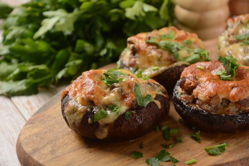 Stuffed mushroom caps with cream cheese, parmesan, garlic and herbs.
