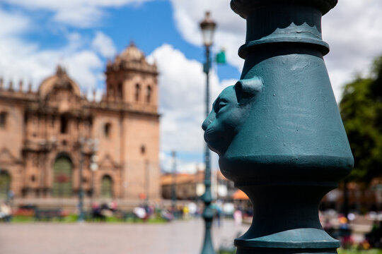 Light Pole With A Puma Sculpture In Cusco Peru. Traditional Light Pole In Peruvian Andes In Cusco Main Square.
