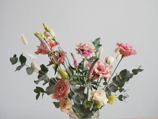 Bouquet of flowers: Carnation, lisianthus, bunny tail grass, eucalyptus and speedwell flowers