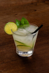 caipirinha cocktail on a wooden background