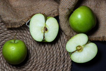 Green apples on a dark background. Fruit theme. fruit good for health