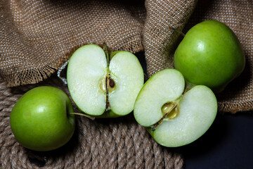 Green apples on a dark background. Fruit theme. fruit good for health