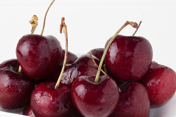 Fresh cherries isolated on white background.