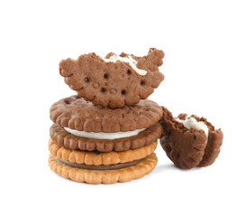 Different tasty sandwich cookies on white background