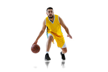 Obraz na płótnie Canvas Full length portrait of professional basketball player training isolated on white studio background. Sport, motion, activity, movement concepts.