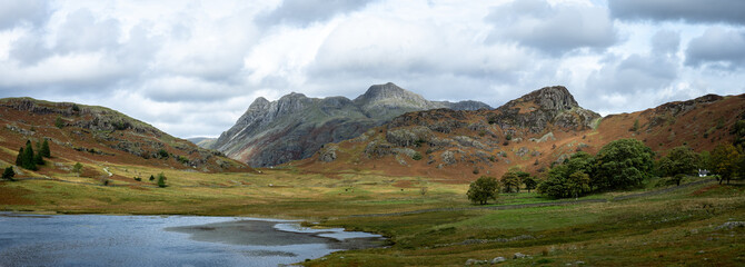 Blea Tarn, Lake District, England - Panorama view of the lake and the surrounding mountains.