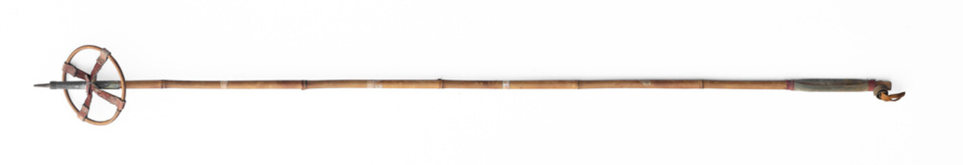 vintage bamboo ski poles isolated on white background