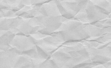 Closeup crumpled grey paper texture background, texture.Gery paper sheet board with space for text ,pattern or abstract background.
