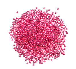 Pile of pink beads on white background, top view