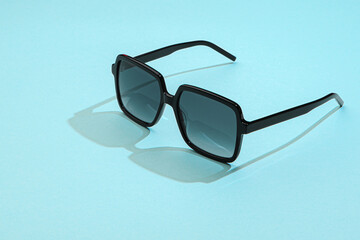 Sunglasses in beautiful fashion concept woman summer beach accessories. Sunglasses in sunlight on...