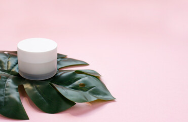 Mockup white plastic tube for moisturizer, lotion, facial cleanser background top view. Delicate purity skin care product