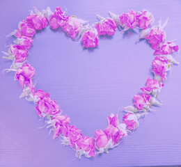 Valentine's day concept. Greeting card. Roses form a heart shape. Toned image color Very Peri