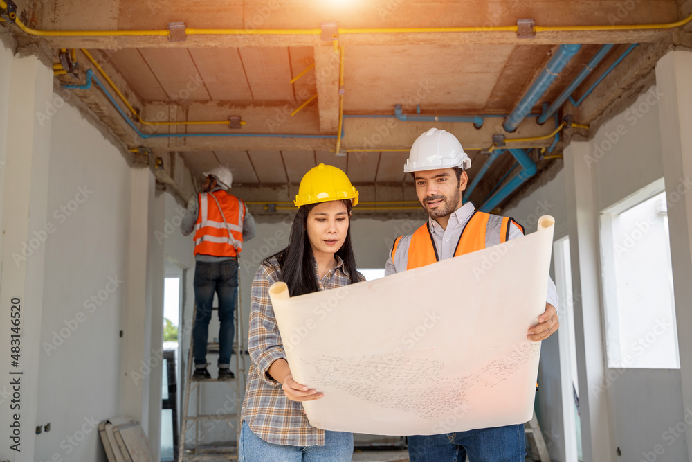 Aufkleber Engineers are discussing data working and blueprint with architectural project at new construction site,Engineering tools and construction concept.