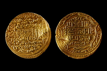 A pile of golden coins , saving money, business and financial concept. selective focus. Gold treasure. Ancient  coin. Golden money. rich government money. 