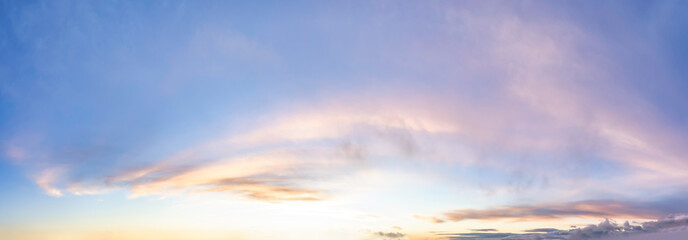 Obraz premium Panoramic View of Cloudscape during a colorful sunset or sunrise. Taken on the West Coast of British Columbia, Canada. Nature Background Panorama