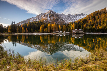 Autumn landscape of lake Nambino, Madonna Di Campiglio, Trentino, Italy.