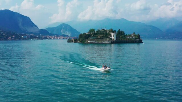 Aerial shot of Borromean Islands with boats on Lake Maggiore, Italy