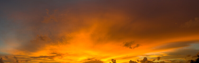 .aerial view stunning sunset above Pu island Kata beac Phuket Thailand. .Scene of colorful red light trough in the dark blue sky..Gradient color. Sky texture, abstract nature background.