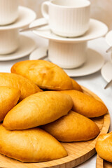 Lots of pies and buns. Hot cakes. Breakfast concept. Breakfast with buns.