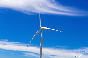 Wind energy turbine. Wind power electricity generator. Climate change and environmental protection.