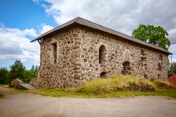 Fototapeta na wymiar Old stone building in rural area