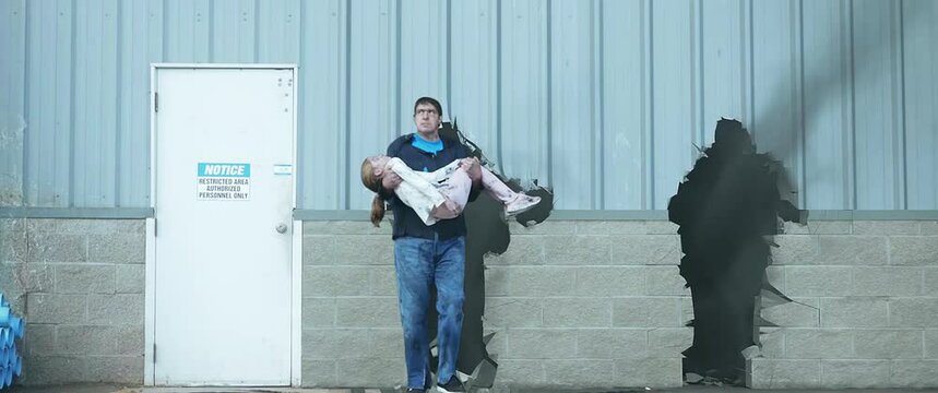 Man Breaks Through Building Explosion in Background | SuperDad Collection