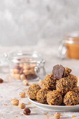 Homemade chocolate truffles on light background