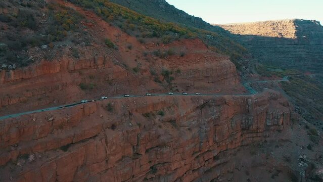cars drive on the mountain and rush along the serpentine. Beautiful mountain landscape