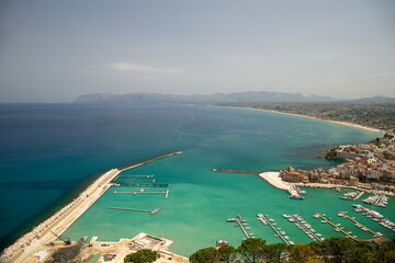 Fototapeta premium Scenic view from above with the marina and the beaches of Castellammare del Golfo, Trapani province, Sicily