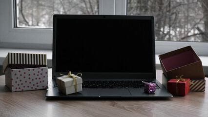 Laptop and gift boxex