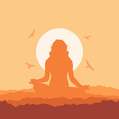 A silhouette of a woman in a lotus pose against a sunset background. Zen, meditation, silhouette of woman practicing yoga lotus position in sunset. Oneness with nature                              