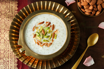 Sabudana Kheer thick pudding with tapioca pearls sago dessert from cassava root Indian sweet mithai...