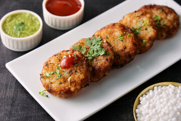 Sabudana vada wada pakora pakode fried snack fritters chutney tapioca pearls sago patties north Indian street food Mahashivratri Shivratri Navratri Ram Navami fasting food vegetarian Indian festival 