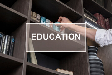 Education word on photo with books in library.