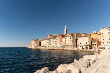 Fototapeta premium Beautiful, coastal town of Rovinj, Croatia famous for its colorful houses built right above the adriatic sea on the rocky shore