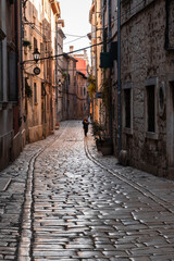 Fototapeta na wymiar Amazing, narrow, colorful streets of Rovinj, popular tourist destination in croatian region of Istria