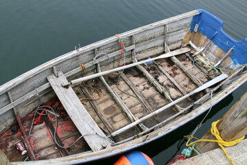 We are looking at the fishing boat from above. The gear has been loaded and the boat is ready to shove off.