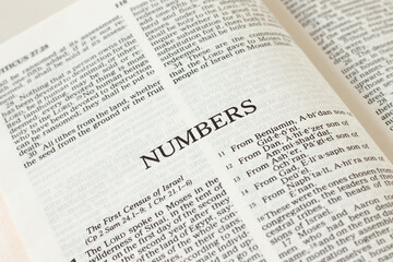 Numbers open Holy Bible Book close-up. Old Testament Scripture. Studying the Word of God Jesus Christ. Christian biblical concept.