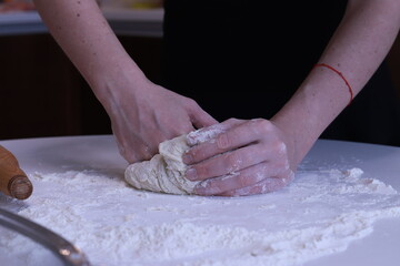 Obraz na płótnie Canvas Preparing dough for baking. Cooking