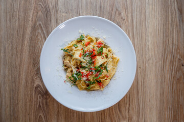 pappardelle pasta with chicken breast and red pepper dish