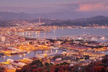 La Spezia, Italy skylilne on the harbor at dusk.