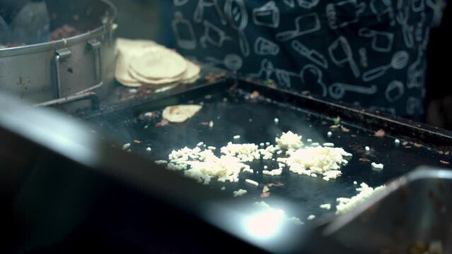 Chef preparing food on the pan